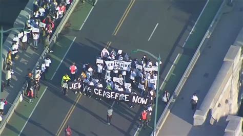 Demonstrators calling for Gaza ceasefire block bridge in Boston